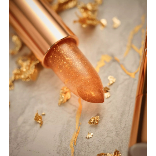 Catrice - Bálsamo labial Glam In Gold Glow