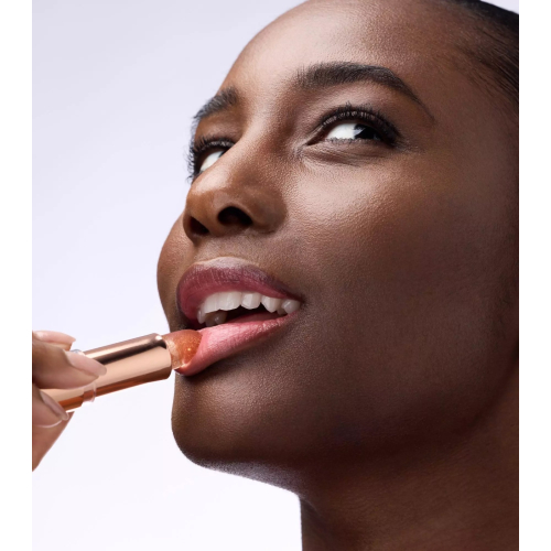 Catrice - Bálsamo labial Glam In Gold Glow