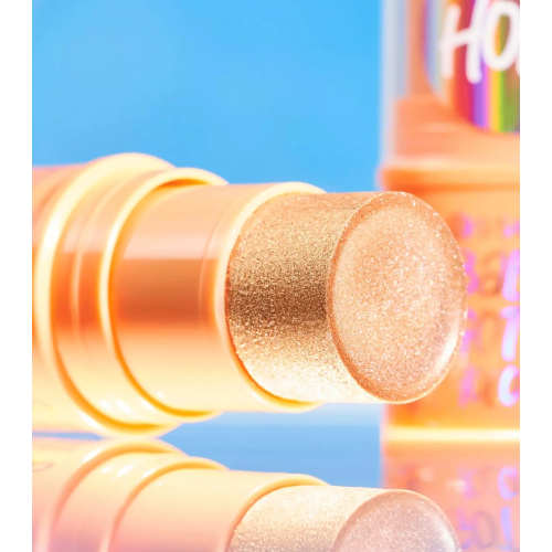 essence - Iluminador en stick Baby Got Holo Glow - 10: Apricotly