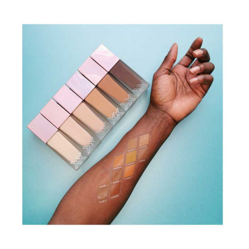 XX Revolution - Base de maquillaje Glow Skin Fauxxdation - FX13
